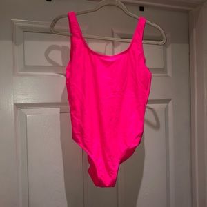 Hot pink one piece suit
